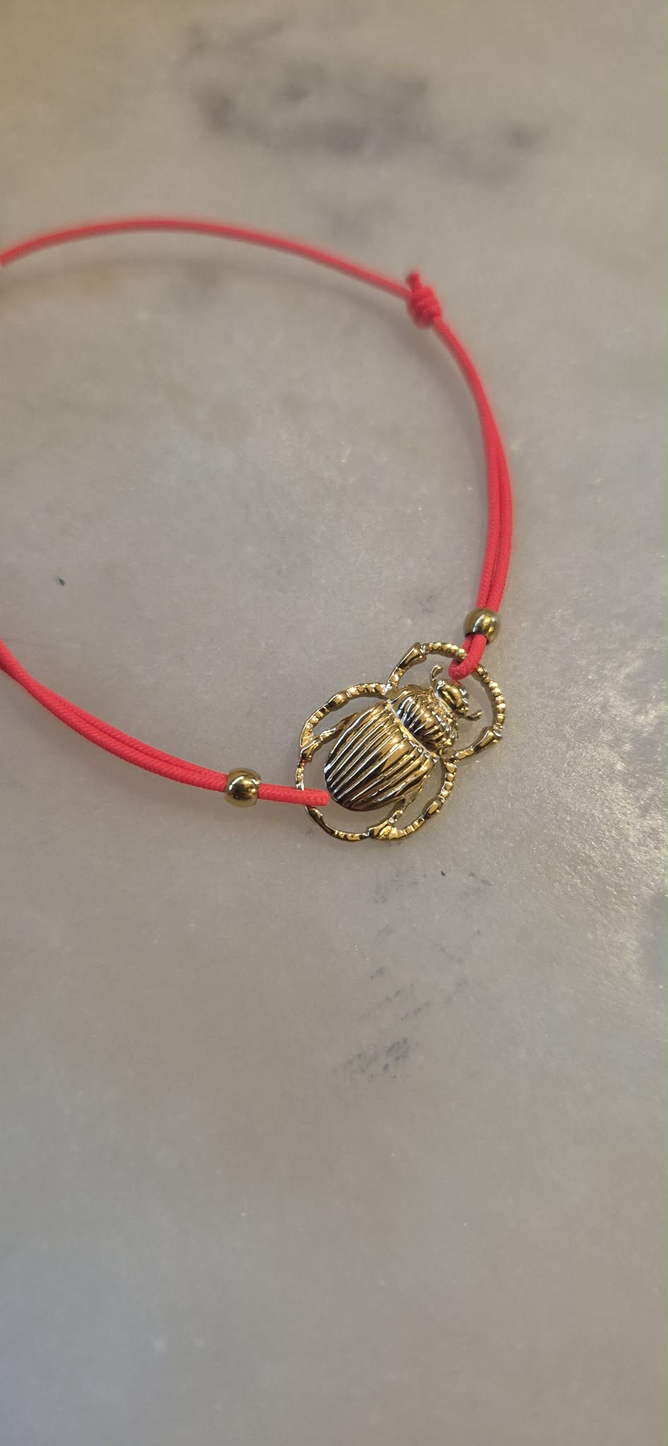 Bracelet scarabée orange Fluo